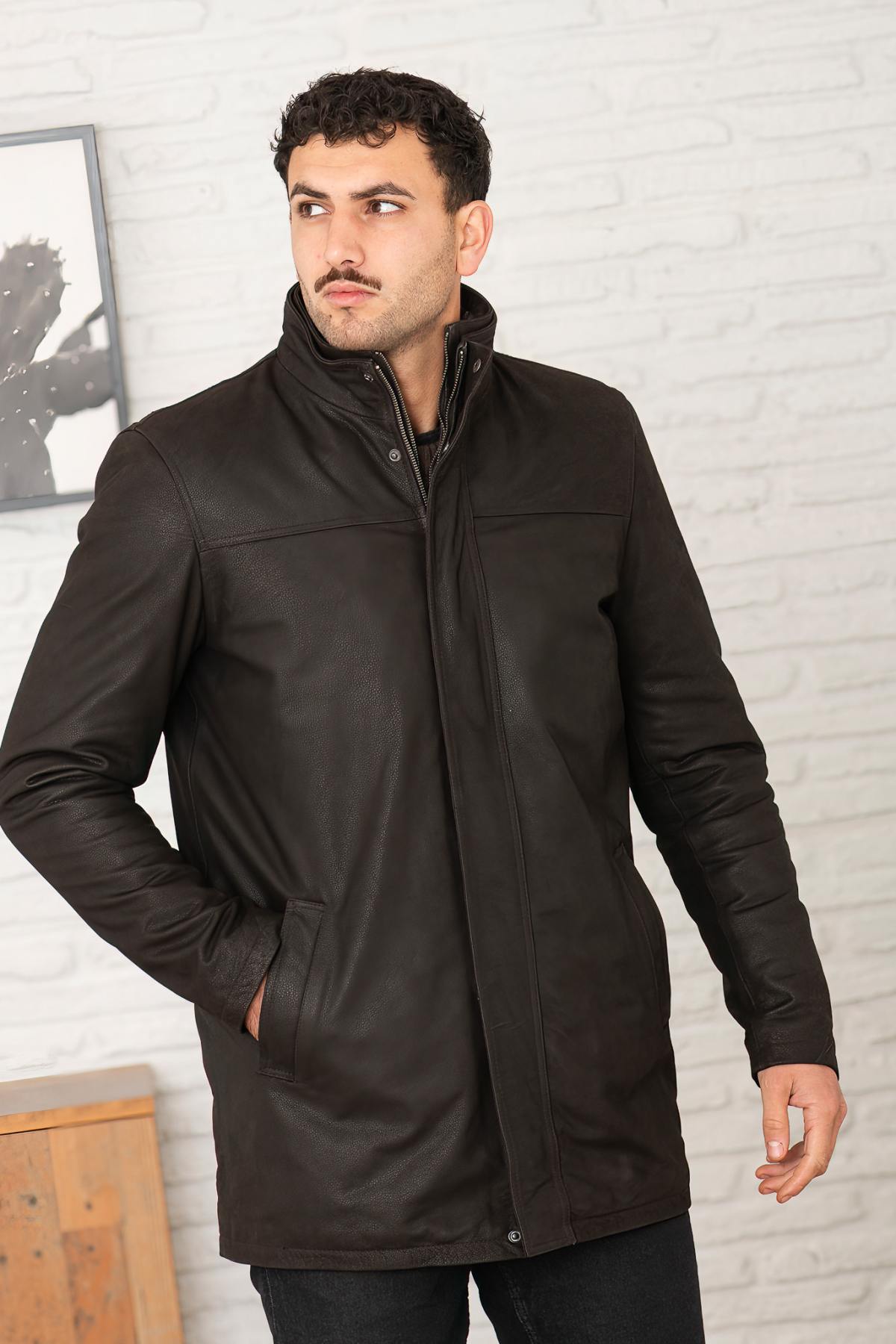 Dark brown buffalo leather parka with faux-fur hood and wool warmth. - Image n°1