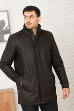 Dark brown buffalo leather parka with faux-fur hood and wool warmth. - Image n°1