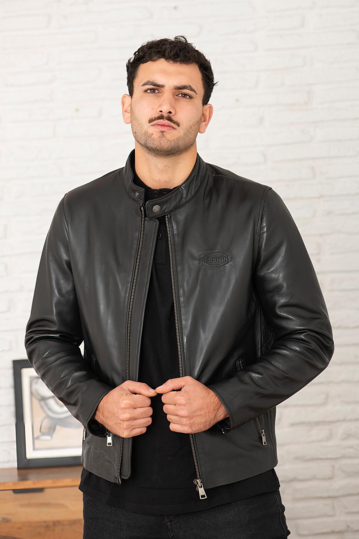 Black leather biker jacket with embossed Redskins logo - Image n°1