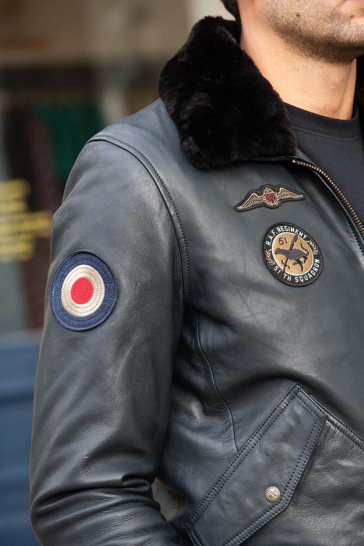 Navy blue leather bomber jacket with Royal Air Force patches - Image n°2