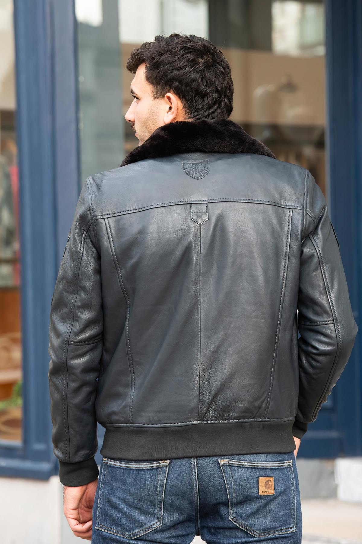 Navy blue leather bomber jacket with Royal Air Force patches - Image n°3
