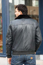 Navy blue leather bomber jacket with Royal Air Force patches - Image n°3