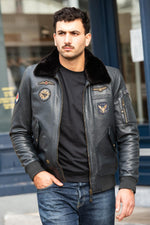 Navy blue leather bomber jacket with Royal Air Force patches - Image n°1