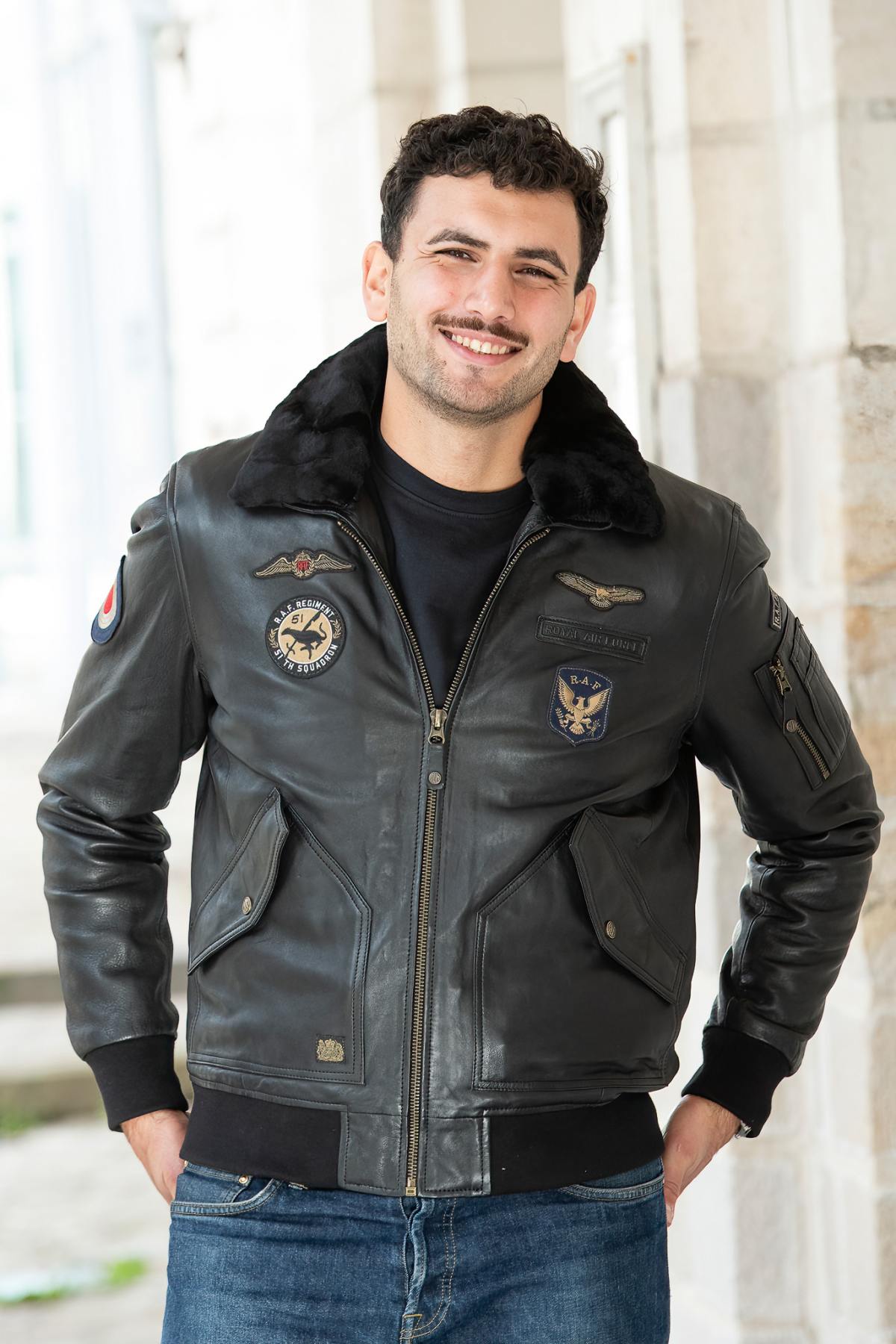 Black leather bomber jacket with Royal Air Force patches - Image n°1