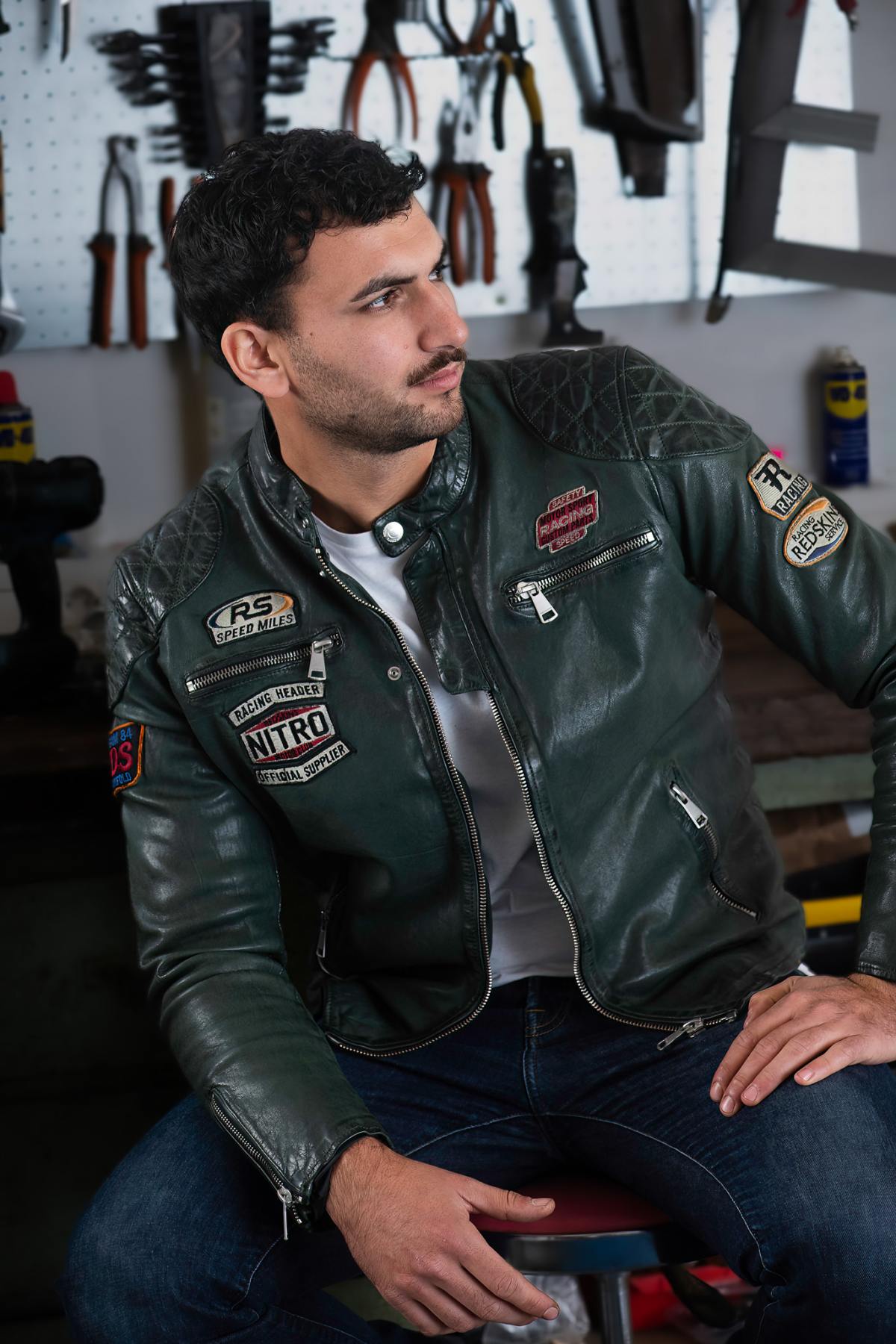 Forest-green sheep leather biker jacket with retro racing patches. - Image n°1