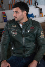 Green leather jacket with textured shoulders and racing badges - Image n°5