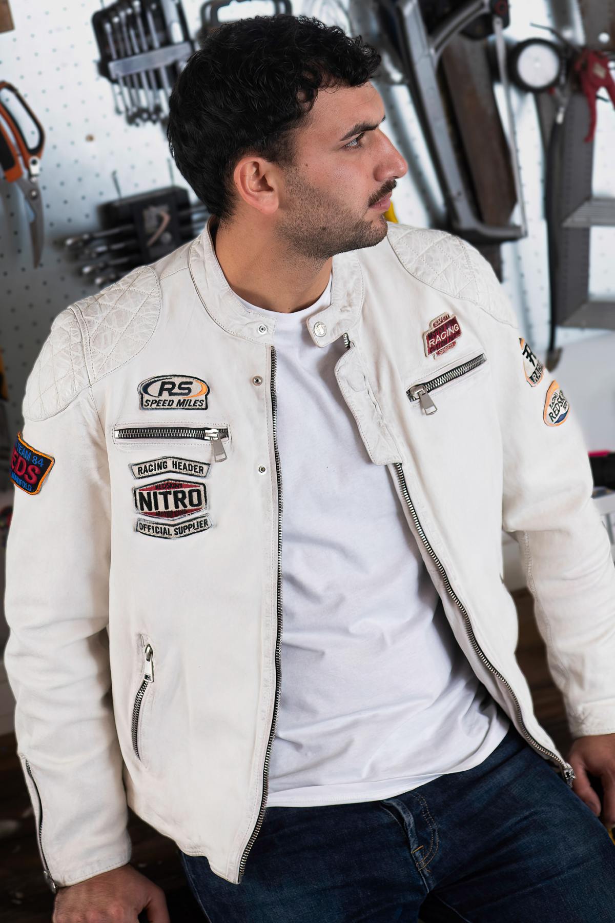Off-white lambskin biker jacket with quilted detailing and patches. - Image n°8
