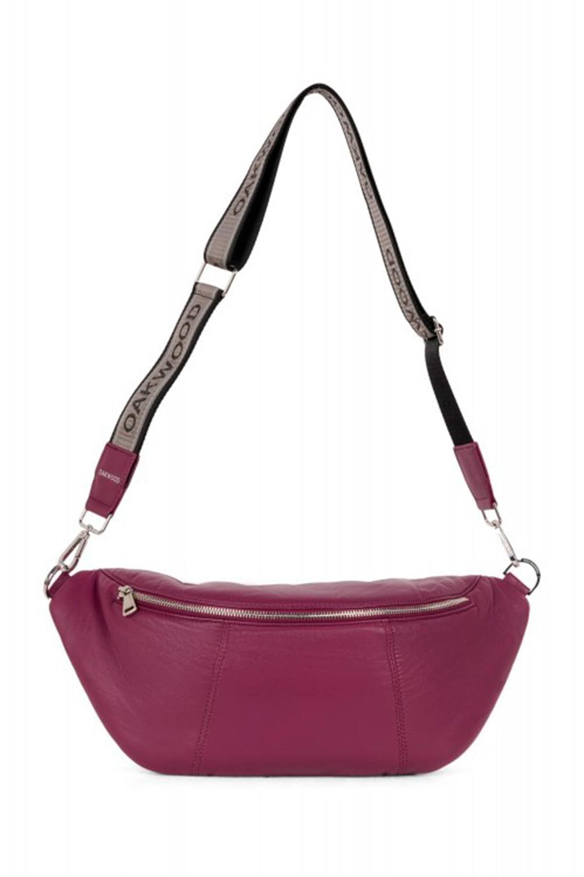 Women's plum-colored leather fanny pack - Image n°1