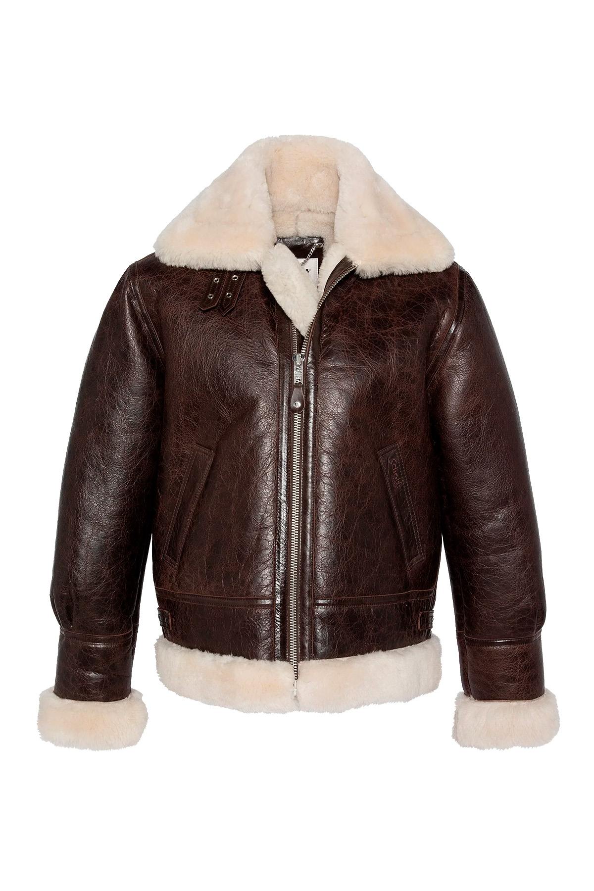 Vintage warmth meets Schott's B-3 bomber in cracked brown shearling. - Image n°5