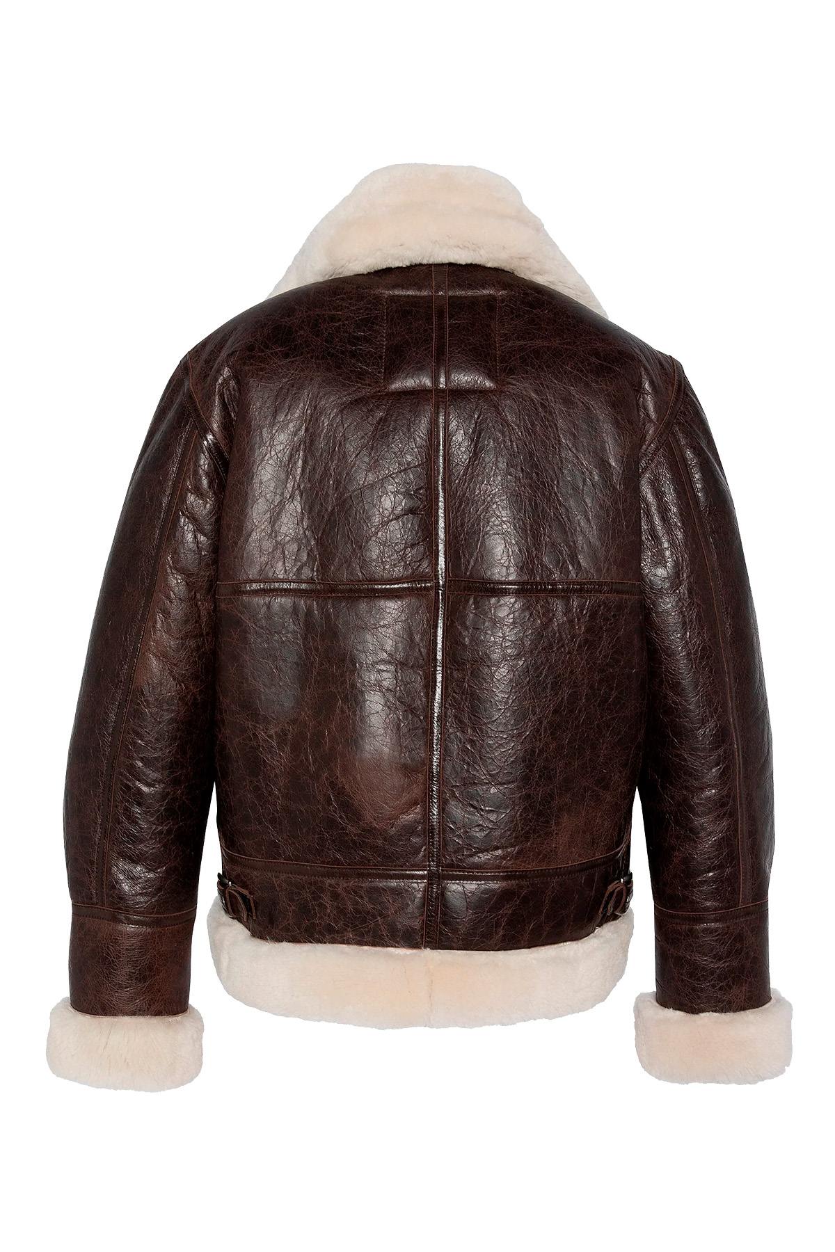 Vintage warmth meets Schott's B-3 bomber in cracked brown shearling. - Image n°6
