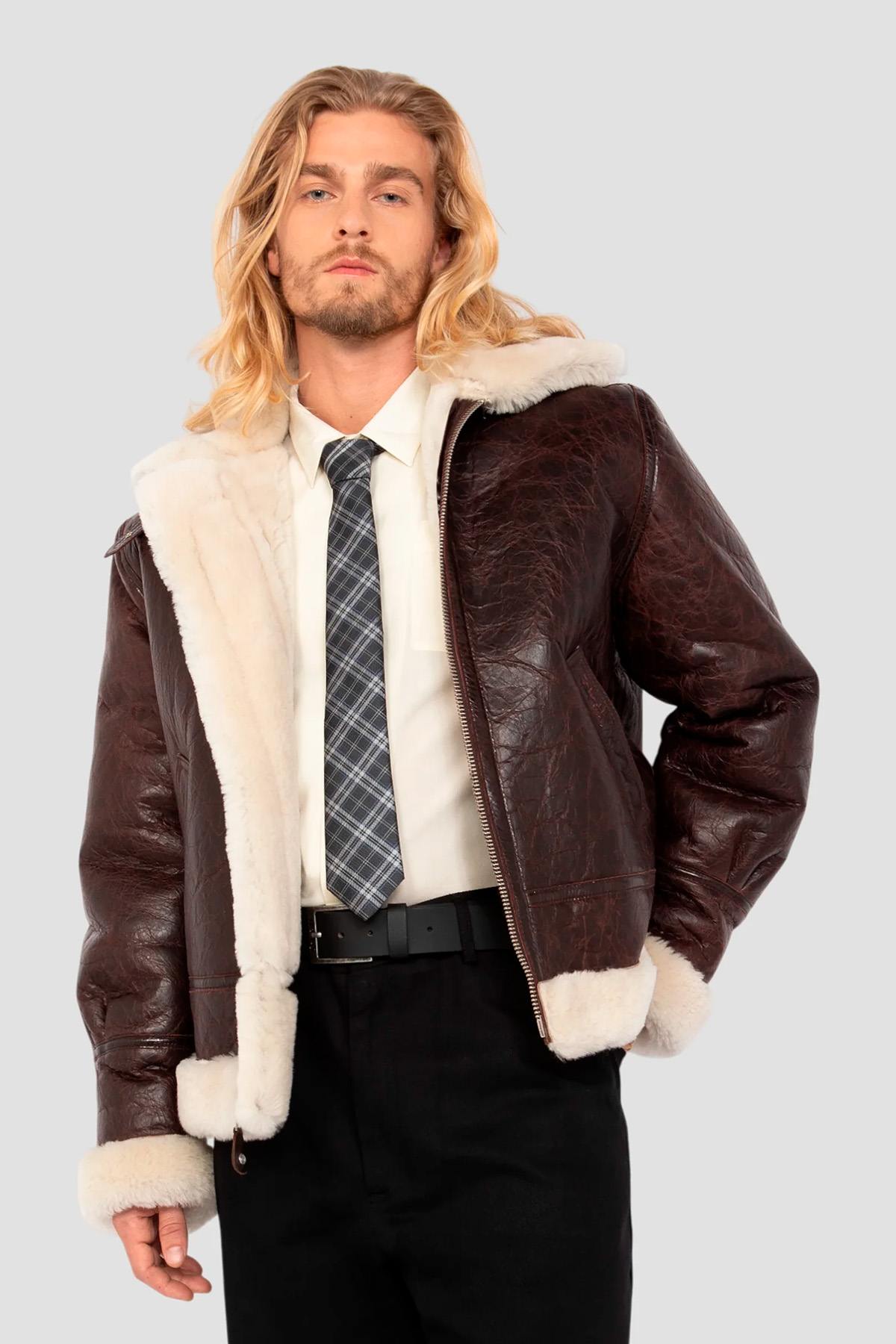 Vintage warmth meets Schott's B-3 bomber in cracked brown shearling. - Image n°4