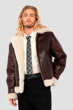 Vintage warmth meets Schott's B-3 bomber in cracked brown shearling. - Image n°4