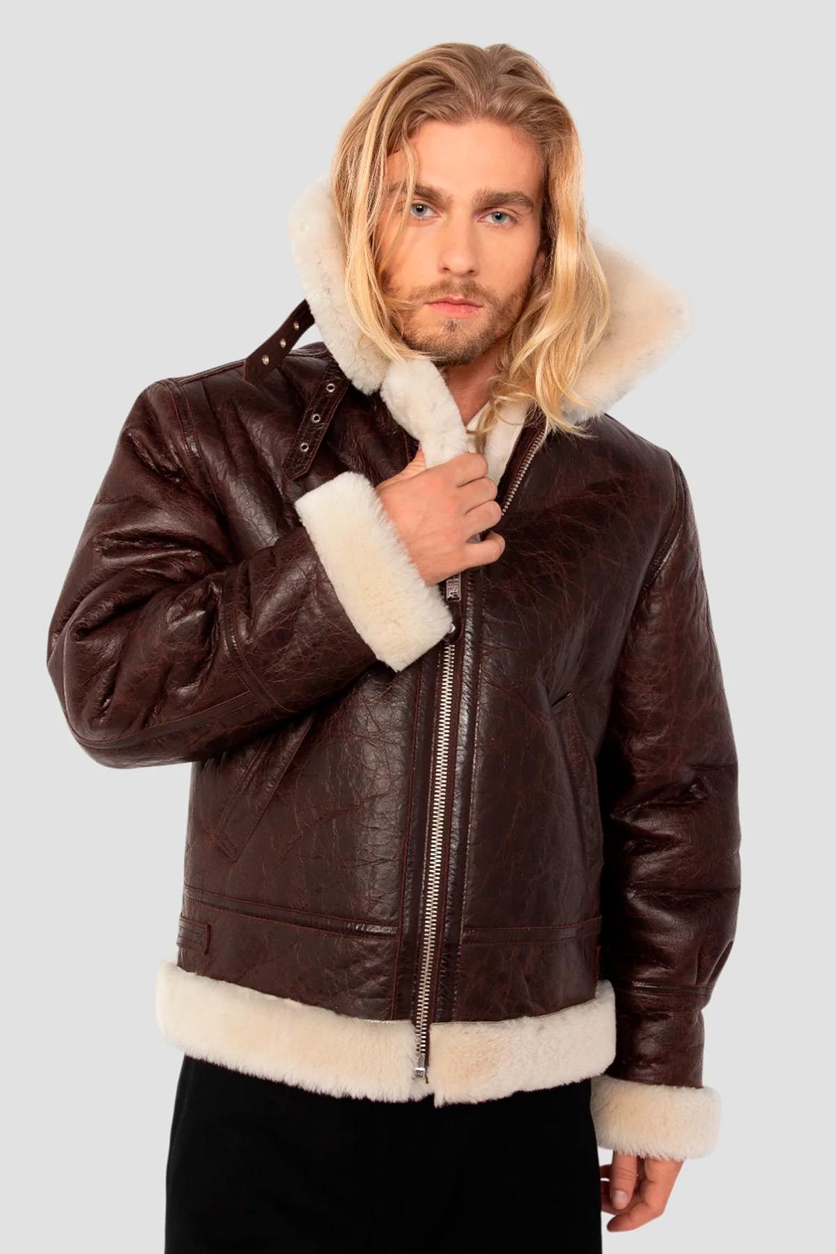 Vintage warmth meets Schott's B-3 bomber in cracked brown shearling. - Image n°9