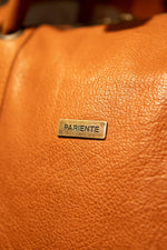 High-end leather travel bag in cognac color. - Image n°2