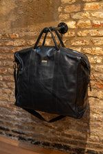 High-end black leather travel bag - Image n°1