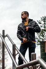 Black and cognac lambskin jacket with removable hood and biker edge. - Image n°7