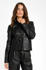 Trendy black leather jacket with shirt collar and button closure - Image n°1