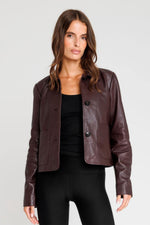 Burgundy leather jacket with shirt collar and button closure - Image n°1