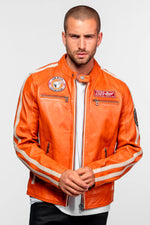 Orange leather biker-collar jacket with patches - Image n°1