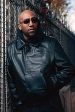 Black cowhide jacket with 3D embroidery and a structured teddy cut. - Image n°2