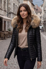 Black leather puffer jacket with genuine fawn fur collar and hood - Image n°1