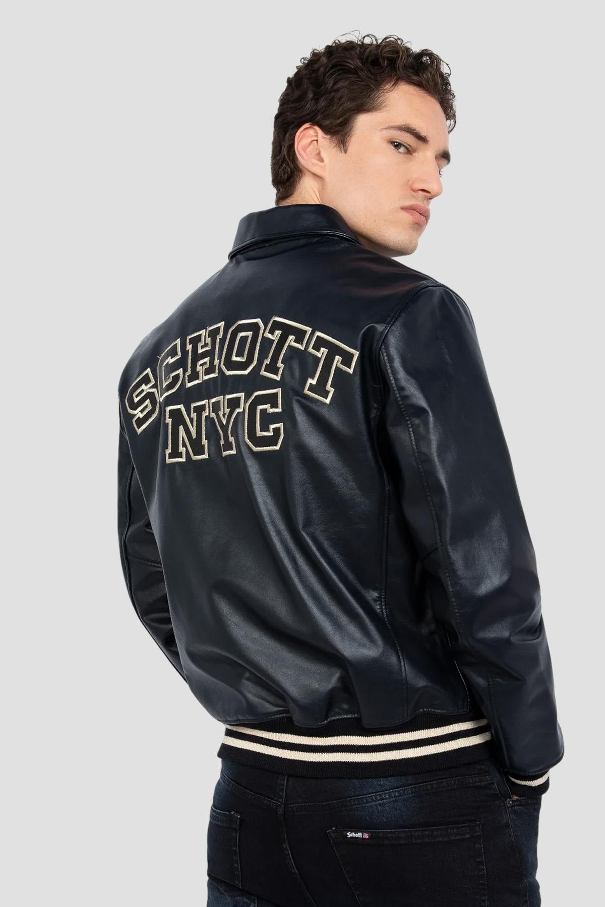 Schott's navy vachetta leather varsity jacket with off-white stripes. - Image n°1