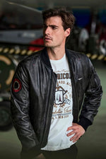 Black leather bomber jacket with sleeve patch - Image n°1