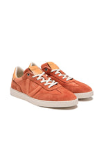Low-top sneakers in brick-colored suede leather - Image n°1