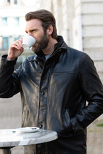 Black leather jacket with stand-up collar and removable facing - Image n°1