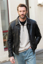 Black lambskin jacket with an aged finish, soft and lightweight. - Image n°1