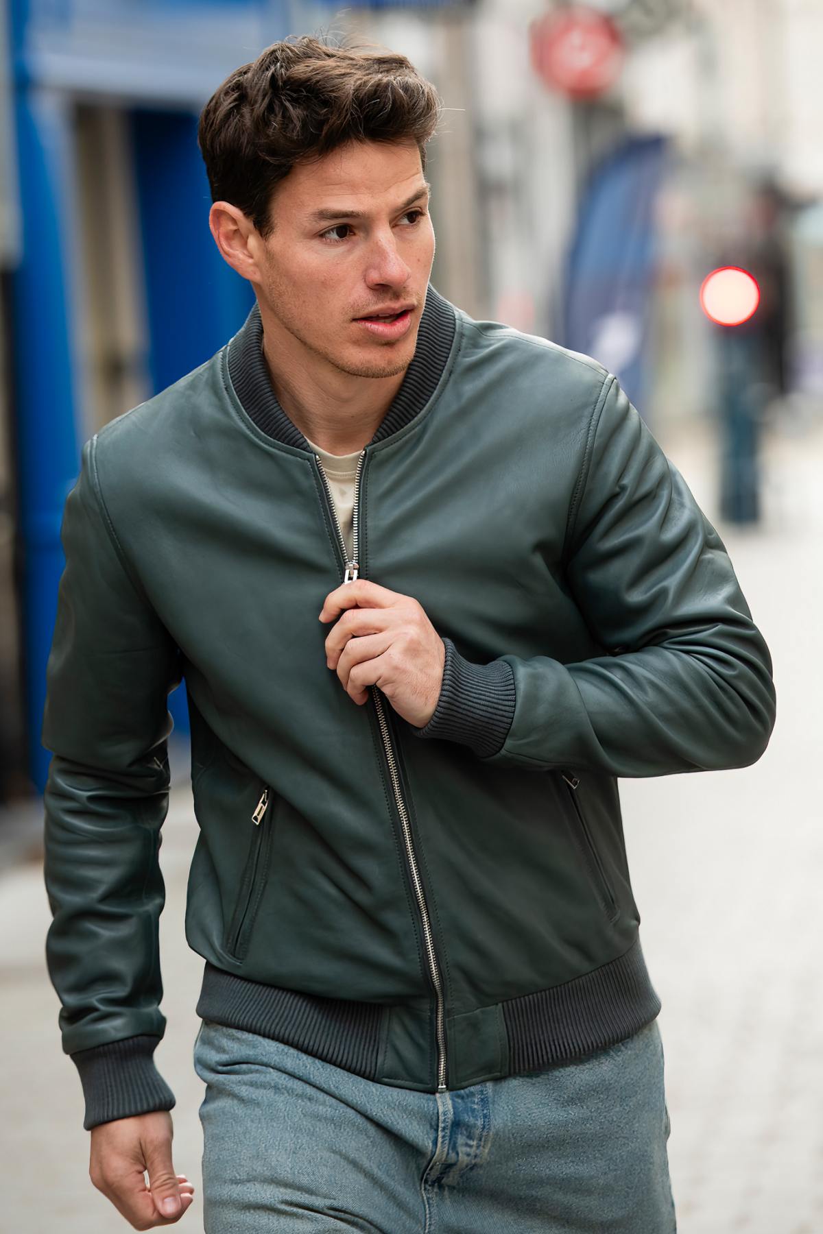A slim opal blue lambskin jacket, soft and sharp for timeless wear. - Image n°1
