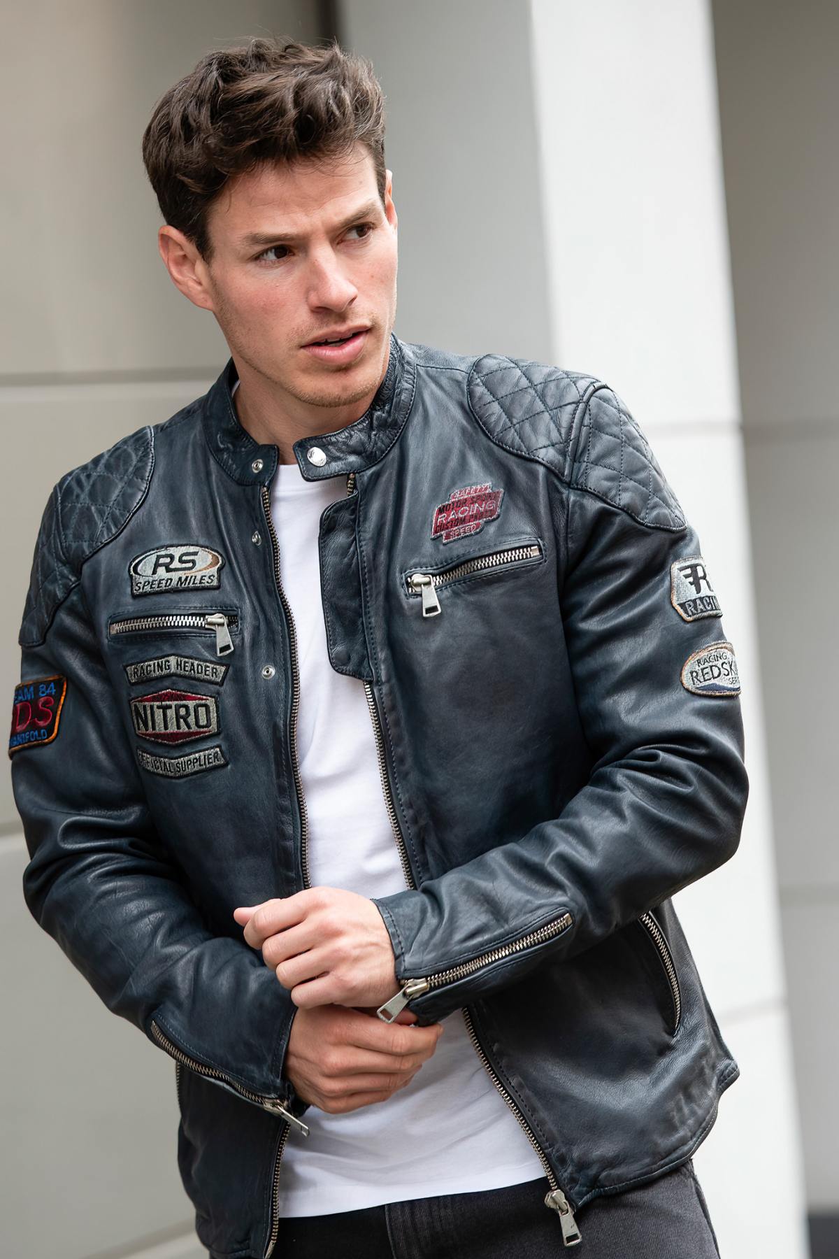 Bold lambskin jacket in ocean blue. Slim fit with six racing badges. - Image n°1