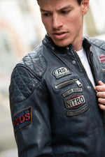 Bold lambskin jacket in ocean blue. Slim fit with six racing badges. - Image n°3