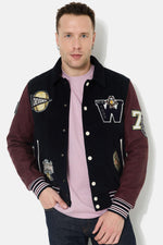 Teddy varsity jacket in navy blue and burgundy leather - Image n°1