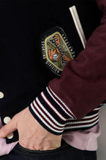 Teddy varsity jacket in navy blue and burgundy leather - Image n°8