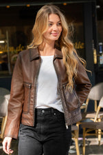 A cognac sheep leather jacket with a slim, aged biker look. - Image n°5