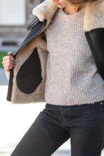 Rich brown sheepskin bomber, beige fur-lined for winter warmth. - Image n°7