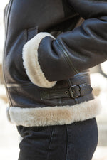 Rich brown sheepskin bomber, beige fur-lined for winter warmth. - Image n°4