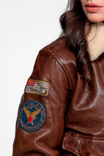 Warm, tailored lambskin aviator in dark cognac with fur collar. - Image n°9