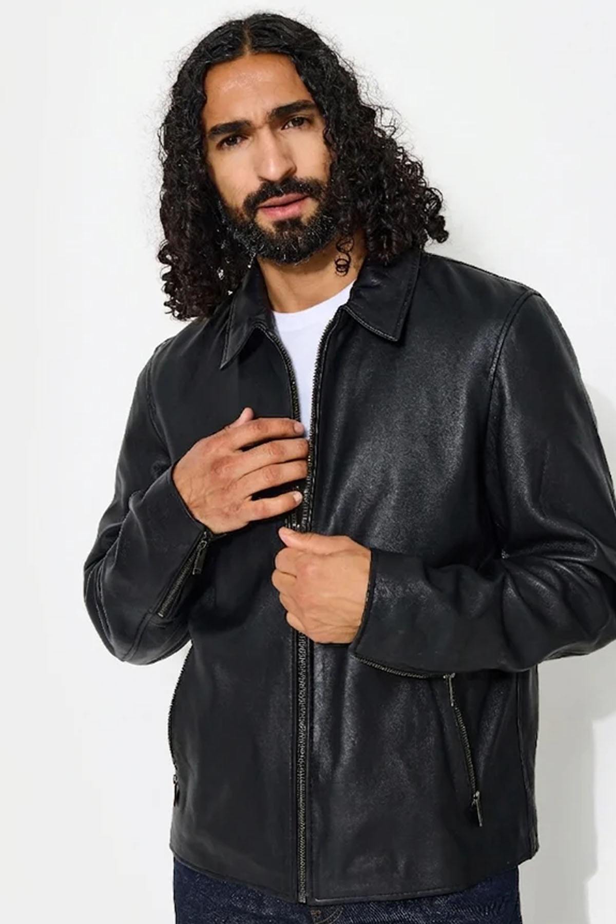Black lambskin jacket by Chevignon. Short, zip-detailed, and sharp. - Image n°4