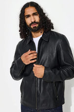 Black lambskin jacket by Chevignon. Short, zip-detailed, and sharp. - Image n°4