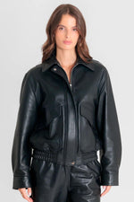 Oversized black leather jacket with an elasticated waist - Image n°1