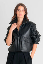 Oversized black leather jacket with detachable sleeves - Image n°1