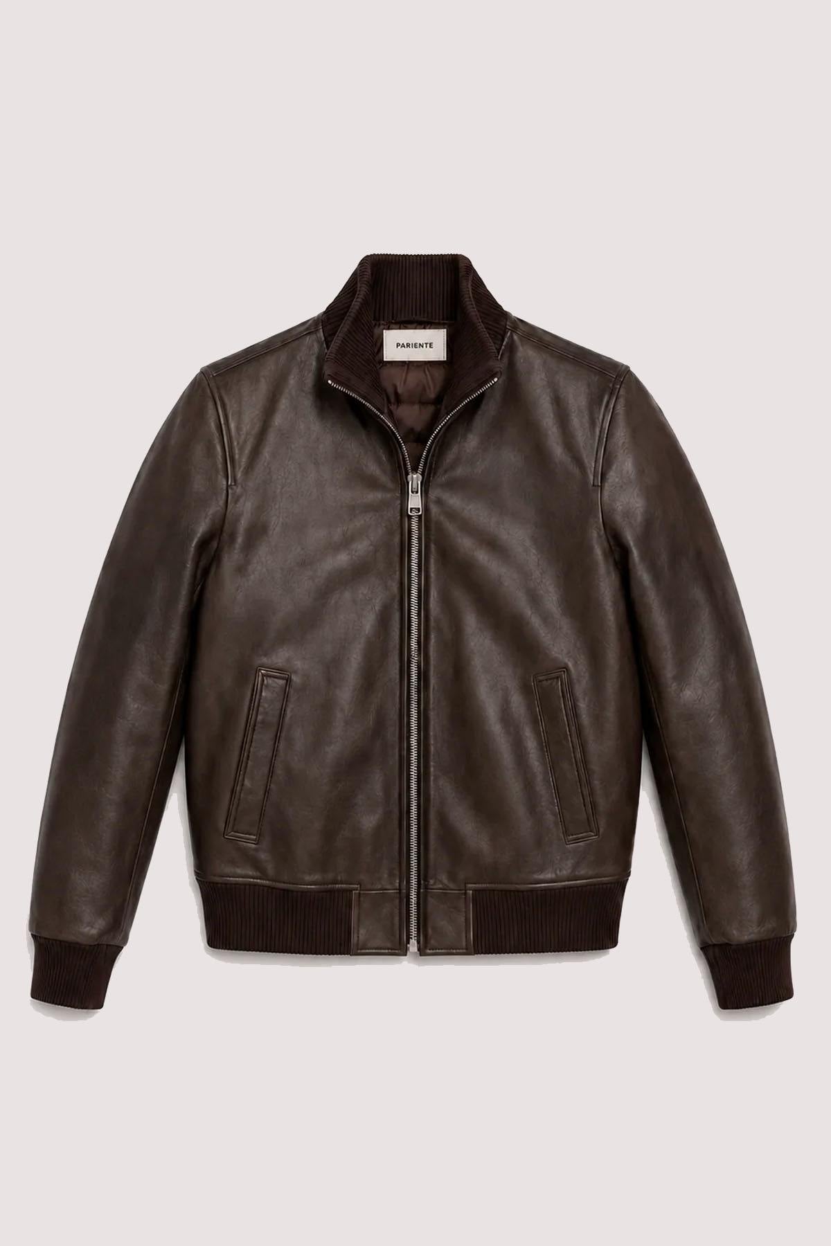 Brown leather varsity jacket with a quilted, puffer-style lining. - Image n°1