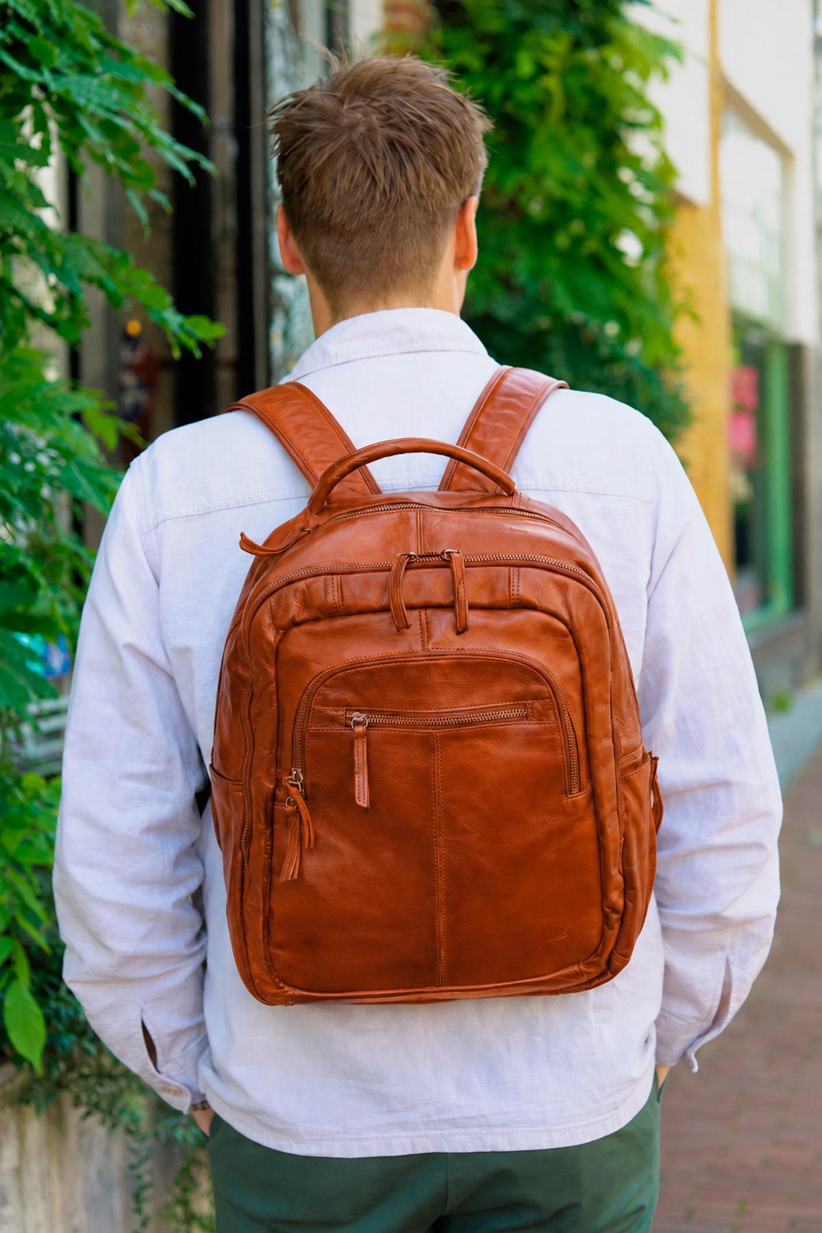 Practical cognac leather backpack - Image n°1