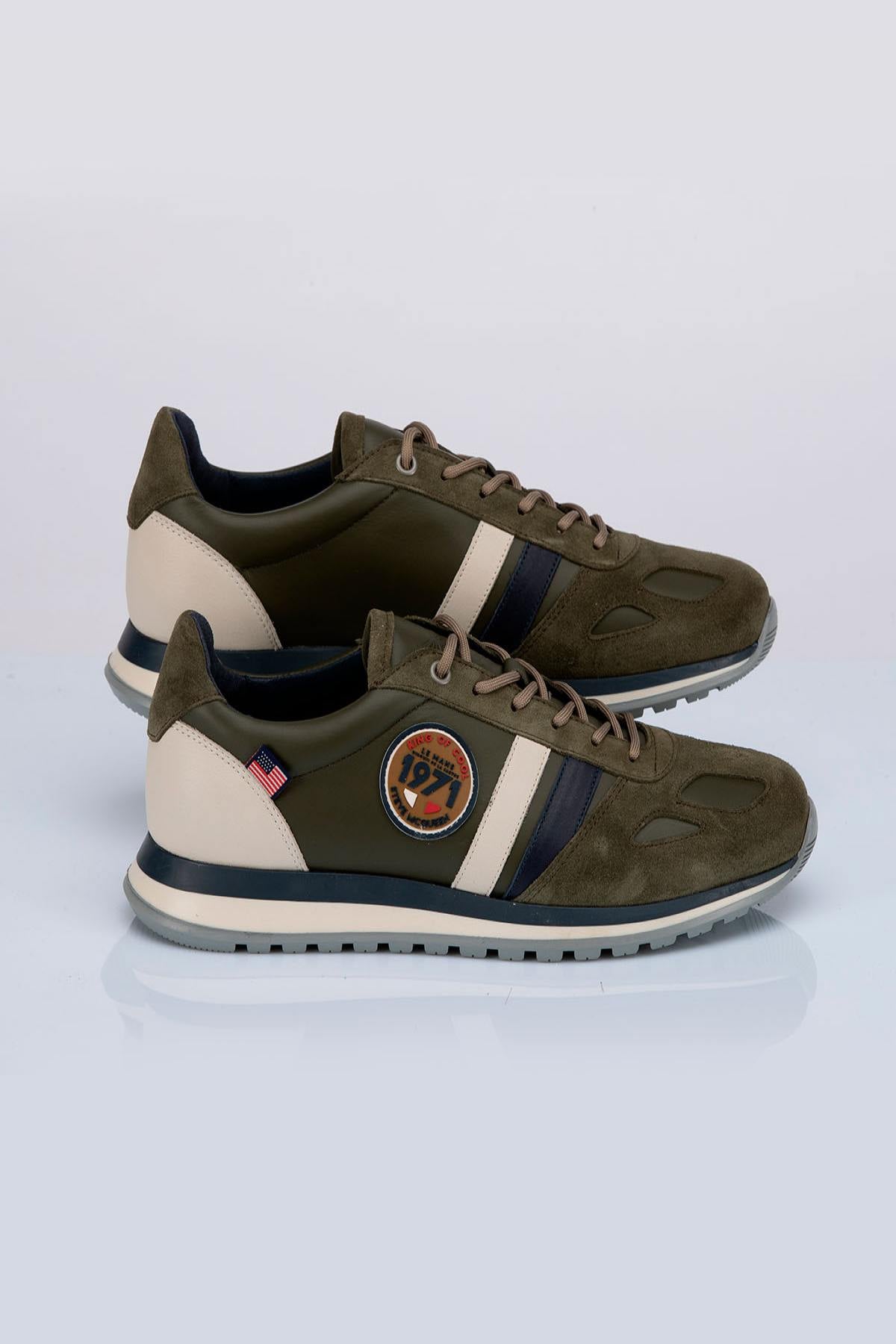 Men's green leather sneakers - Image n°1
