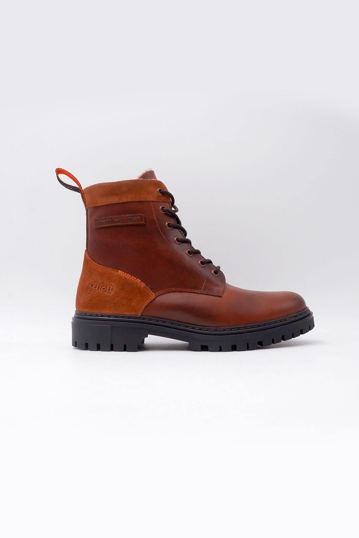 Brown leather boots with paneling - Image n°1