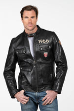 Black leather jacket with a biker collar and multiple pockets - Image n°1