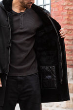 Black hooded long coat in shearling leather - Image n°6