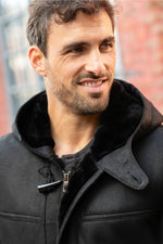 Black hooded long coat in shearling leather - Image n°4